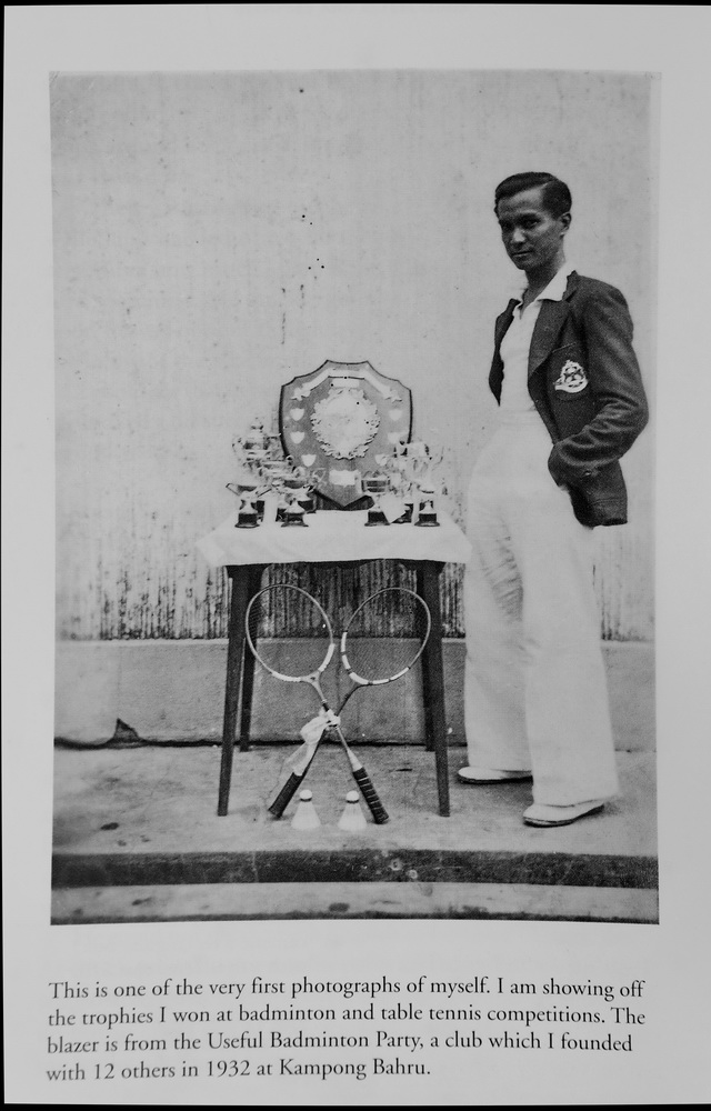 A4-sized photo of Mr Wee with cups and racquets-1938
