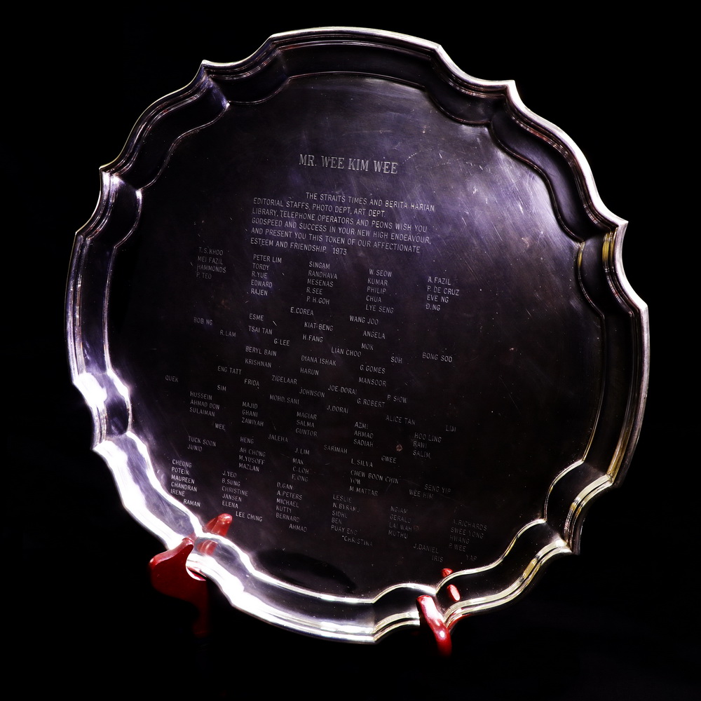 Silver plate with names of staff 