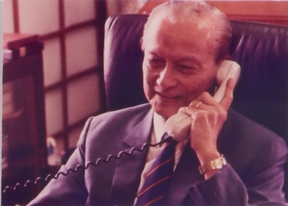 President Wee on the phone