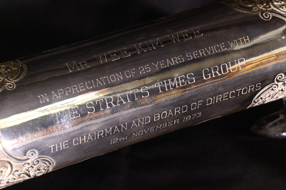 Close up on the Scroll Holder From The Straits Times